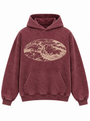 Front view of the Eroded Terrain burgundy acid wash boxy hoodie with large oval sand-colored terrain-map print on the chest