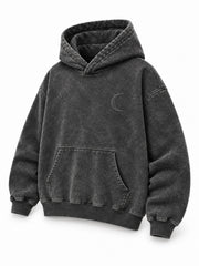 Front three-quarter view of the Lunar Ash washed charcoal acid wash boxy hoodie