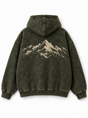 Back view of the Olive Fade olive acid wash oversized hoodie with a large cream mountain-range graphic