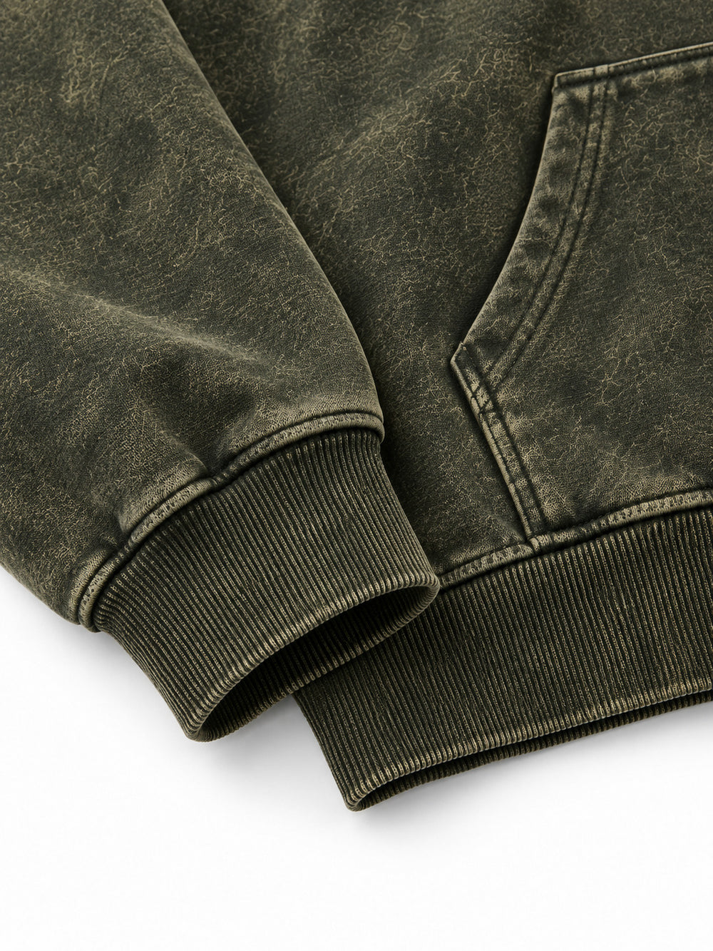 Close-up of the cuff and hem rib of the Olive Fade olive acid wash oversized hoodie