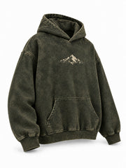 Front three-quarter view of the Olive Fade olive acid wash oversized hoodie