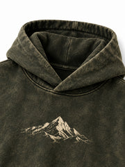 Close-up of the hood and neckline of the Olive Fade olive acid wash oversized hoodie