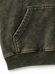 Close-up of the seam stitching of the Olive Fade olive acid wash oversized hoodie