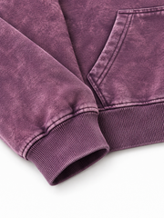 Close-up of the pocket stitching of the Cloud Crop plum acid wash cropped hoodie