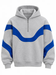 Front view of the Track Curve ash grey appliqué oversized quarter-zip hoodie with electric blue appliqué wave band across the chest and down the sleeves