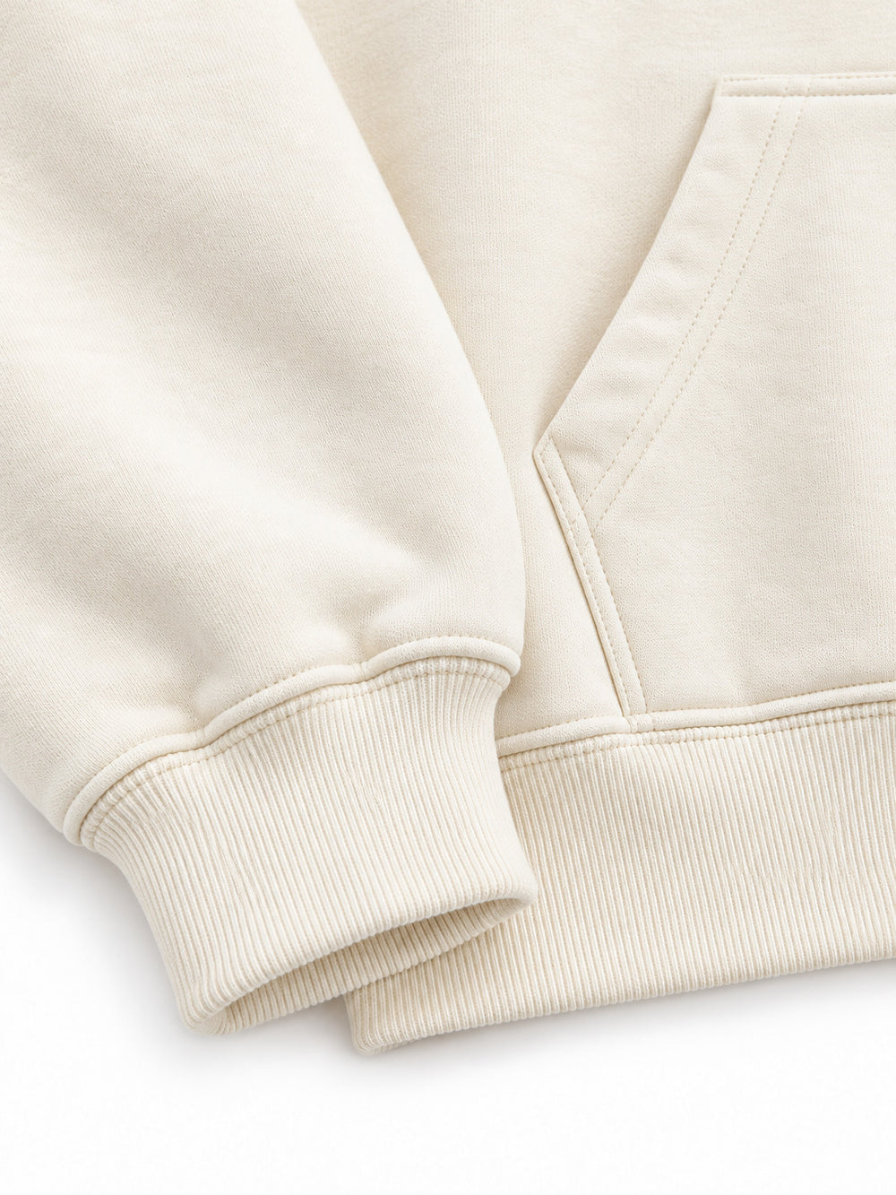 Close-up of the cuff and hem rib of the Cloud Loop cream chenille oversized hoodie