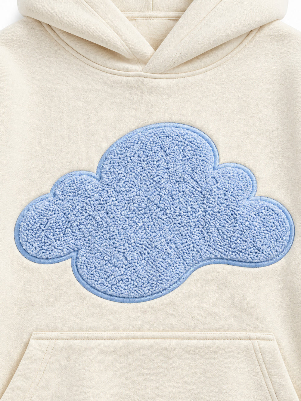 Close-up of the chenille decoration on the Cloud Loop cream chenille oversized hoodie