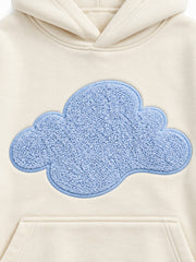 Close-up of the chenille decoration on the Cloud Loop cream chenille oversized hoodie