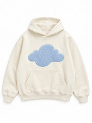 Front view of the Cloud Loop cream chenille oversized hoodie with a large blue chenille cloud across the chest