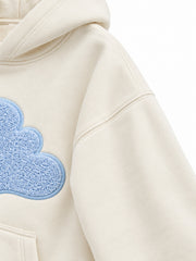 Close-up of the sleeve of the Cloud Loop cream chenille oversized hoodie