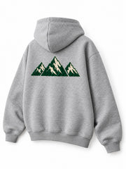 Rear three-quarter view of the Mountain Pile heather grey chenille hoodie