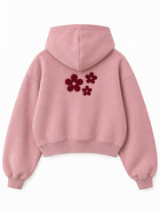 Back view of the Petal Club dusty pink chenille cropped hoodie with a group of smaller burgundy chenille flowers