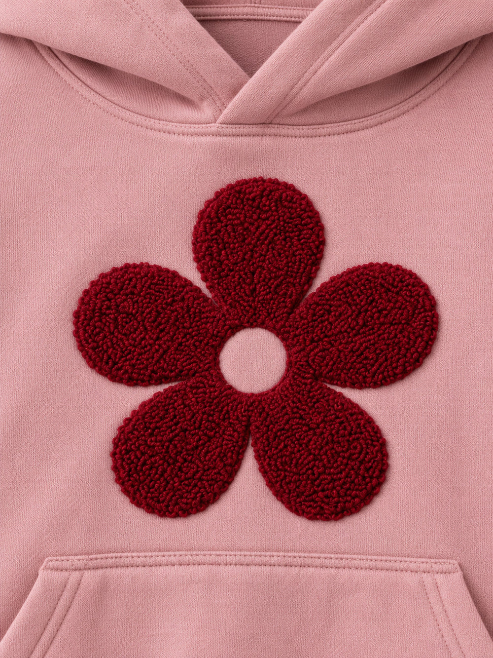 Close-up of the chenille decoration on the Petal Club dusty pink chenille cropped hoodie