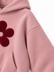 Close-up of the sleeve of the Petal Club dusty pink chenille cropped hoodie