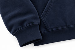 Close-up of the seam stitching of the Varsity North navy chenille oversized hoodie