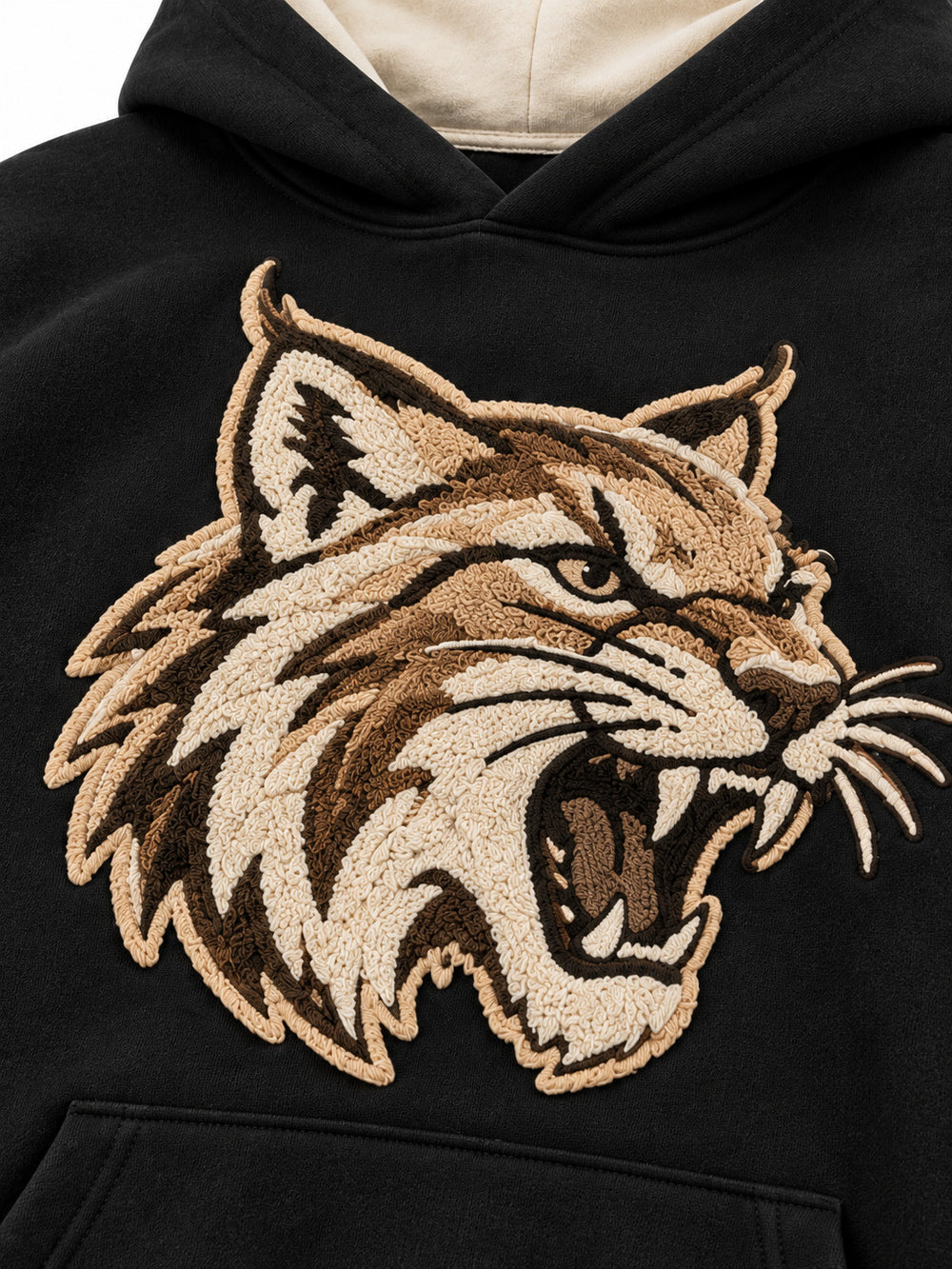 Close-up of the chenille decoration on the Wildcat black chenille hoodie