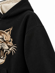 Close-up of the sleeve of the Wildcat black chenille hoodie