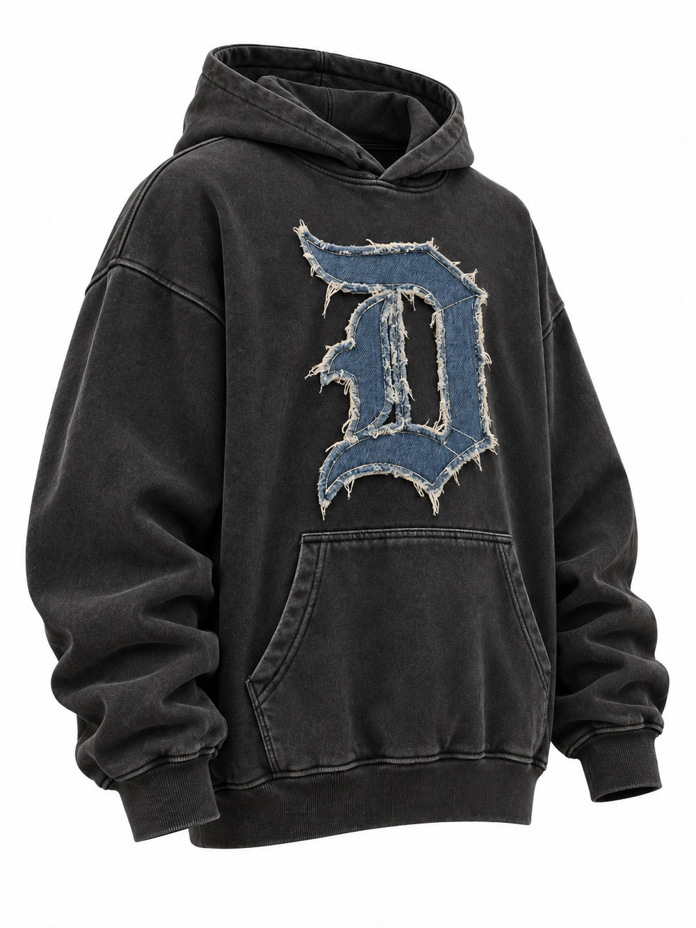 Front three-quarter view of the Denim Letter washed black denim appliqué oversized hoodie