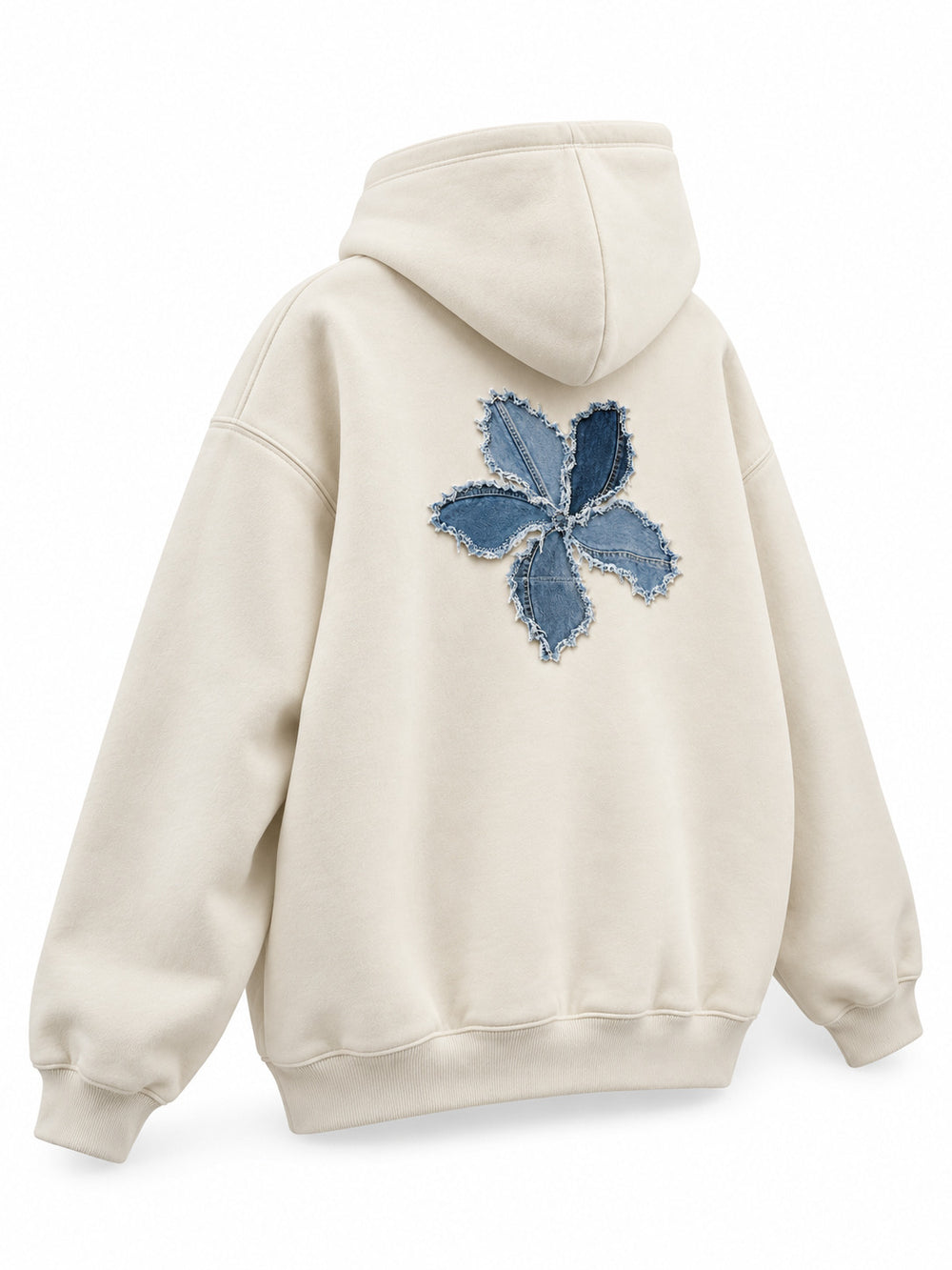 Rear three-quarter view of the Denim Petals cream denim appliqué oversized hoodie