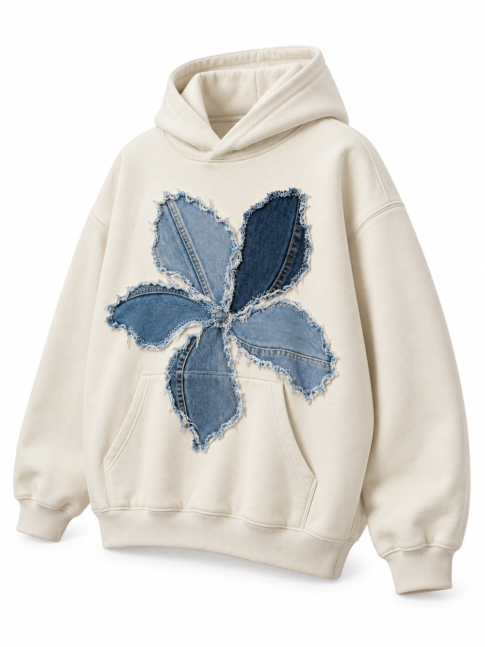 Front three-quarter view of the Denim Petals cream denim appliqué oversized hoodie