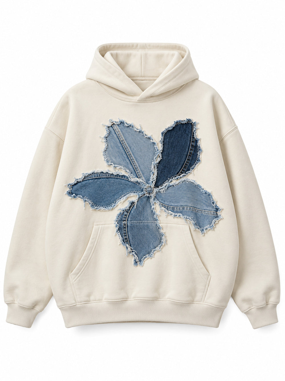 Front view of the Denim Petals cream denim appliqué oversized hoodie with a large flower assembled from blue denim appliqué petals
