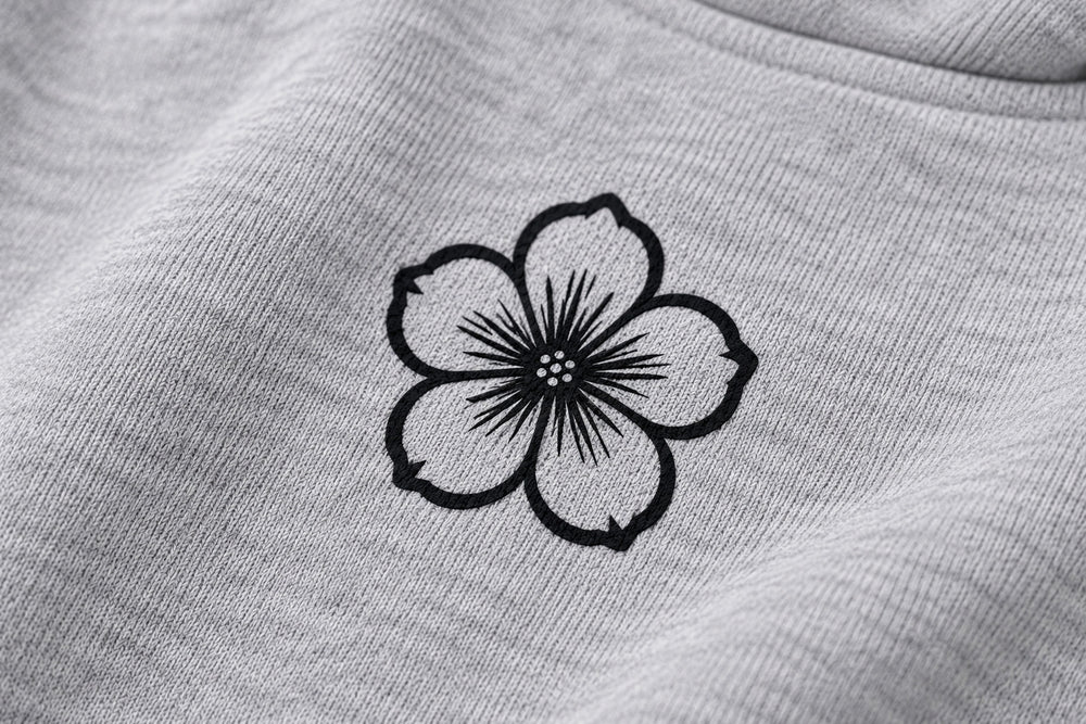 Close-up of the DTF print decoration on the Chrome Bloom ash gray DTF print boxy hoodie