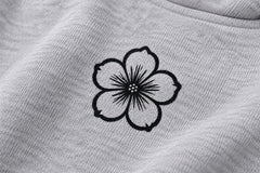 Close-up of the DTF print decoration on the Chrome Bloom ash gray DTF print boxy hoodie