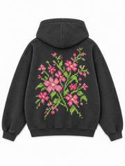 Back view of the Digital Flora charcoal DTF print oversized hoodie with a larger pixel-art floral arrangement