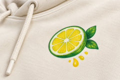 Close-up of the DTF print decoration on the Fresh Cut cream DTF print hoodie