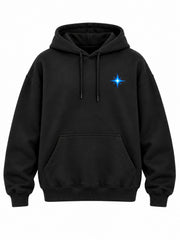 Front view of the Pixel Drift black DTF print oversized hoodie with small electric cyan pixel star