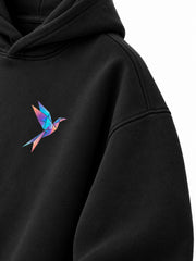 Close-up of the sleeve of the Prism Bird black DTF print oversized hoodie