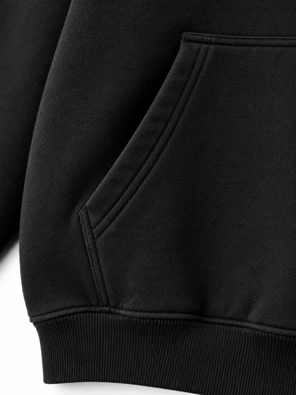 Close-up of the seam stitching of the Prism Bird black DTF print oversized hoodie