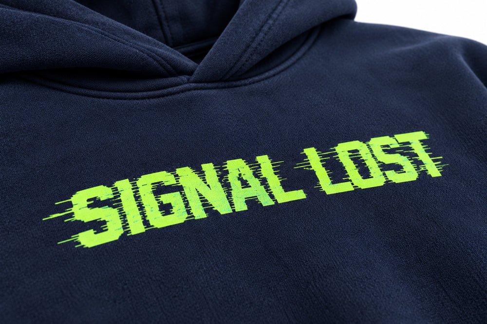 Close-up of the DTF print decoration on the Signal Lost navy DTF print oversized hoodie