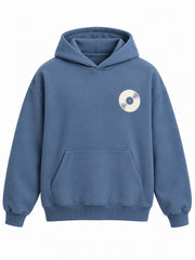 Front view of the Sound Wave steel blue DTF print boxy hoodie with small cream vinyl record