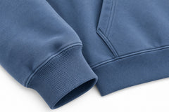 Close-up of the seam stitching of the Sound Wave steel blue DTF print boxy hoodie