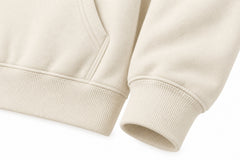 Close-up of the seam stitching of the Sunset Tennis ivory DTF print hoodie