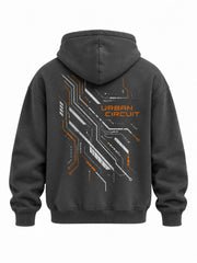Back view of the Urban Circuit charcoal DTF print boxy hoodie with angular silver-gray circuit pattern with orange URBAN CIRCUIT lettering