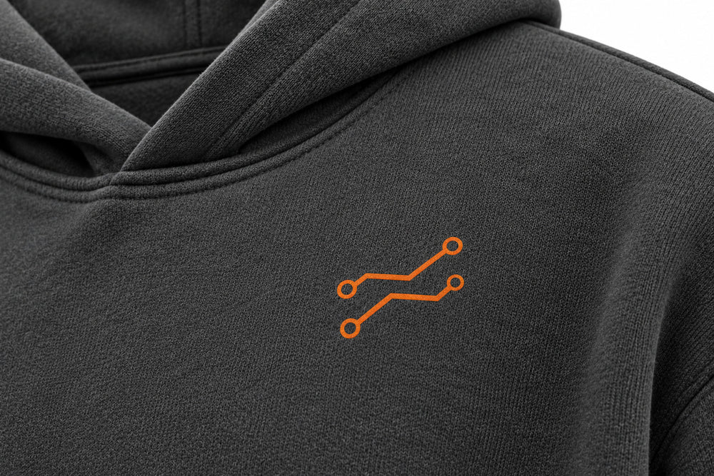 Close-up of the DTF print decoration on the Urban Circuit charcoal DTF print boxy hoodie