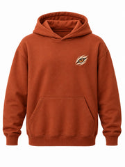 Front view of the Wild Tiger rust DTF print oversized hoodie with small cream tiger-eye emblem