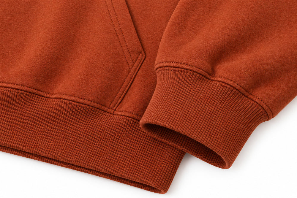Close-up of the seam stitching of the Wild Tiger rust DTF print oversized hoodie