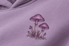Close-up of the DTG print decoration on the After Rain dusty lavender DTG print oversized hoodie