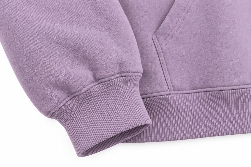 Close-up of the seam stitching of the After Rain dusty lavender DTG print oversized hoodie