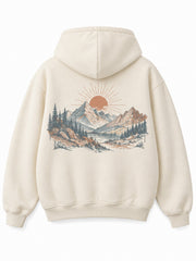 Back view of the Alpine Morning ecru DTG print oversized hoodie with a large illustrated alpine valley at sunrise