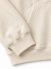 Close-up of the cuff and hem rib of the Alpine Morning ecru DTG print oversized hoodie