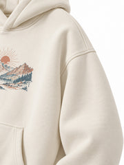 Close-up of the sleeve of the Alpine Morning ecru DTG print oversized hoodie