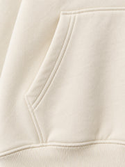 Close-up of the seam stitching of the Alpine Morning ecru DTG print oversized hoodie