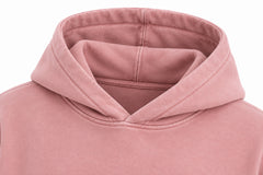 Close-up of the hood and neckline of the Bloom Season faded pink DTG print oversized hoodie