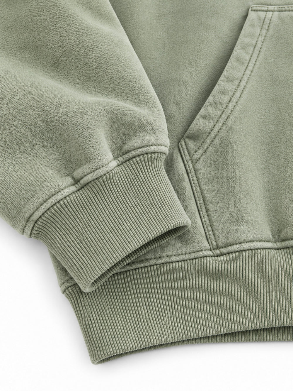 Close-up of the cuff and hem rib of the Botanical Archive sage DTG print hoodie