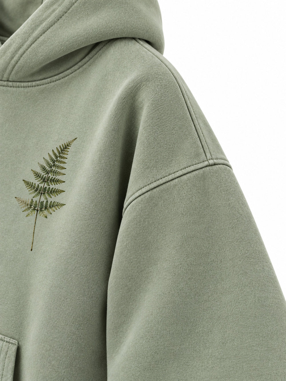 Close-up of the sleeve of the Botanical Archive sage DTG print hoodie