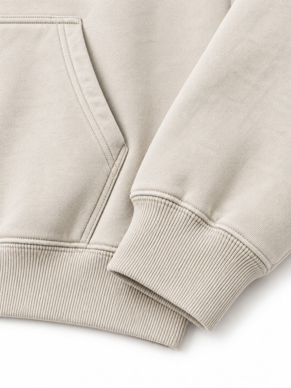 Close-up of the cuff and hem rib of the Coastal Study light stone DTG print hoodie